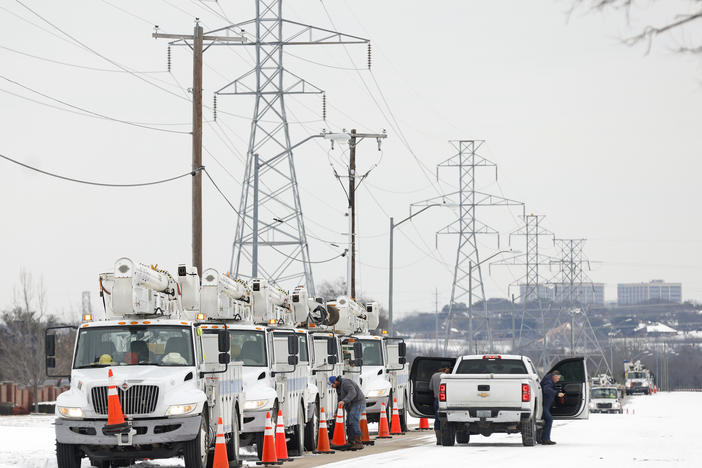 FORT WORTH, TX - FEBRUARY 16: Pike Electric service trucks line up after a snow storm on February 16, 2021 in Fort Worth, Texas. Winter storm Uri has brought historic cold weather and power outages to Texas as storms have swept across 26 states with a mix of freezing temperatures and precipitation. (Photo by Ron Jenkins/Getty Images)