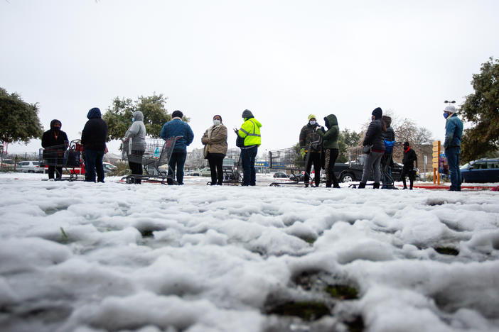 People wait in long lines at an H-E-B grocery store in Austin, Texas, on Wednesday. The  weather disaster is an "absolutely awful nightmare," says Austin City Council member Natasha Harper-Madison.