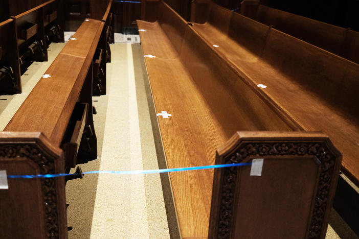 Empty pews are marked for spacing in a Manhattan church on Nov. 27, 2020 in New York City.