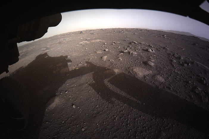 The first high-resolution full-color image of the Martian surface by Perseverance, taken by the Hazard Cameras on the underside of the rover.