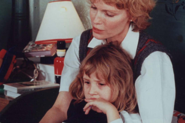 Mia Farrow with her children Ronan (left) and Dylan.
