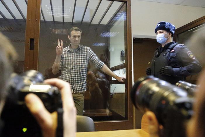 Russian opposition leader Alexei Navalny stands in a Moscow courtroom on Saturday. The court turned down an appeal against his prison sentence.