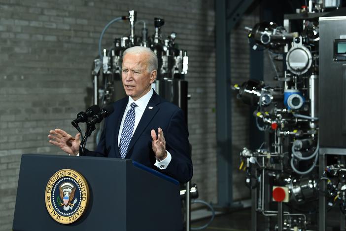 President Biden speaks Friday at a Pfizer COVID-19 vaccine manufacturing site in Portage, Mich. The House could pass a version of his $1.9 trillion COVID-19 relief legislation this week.