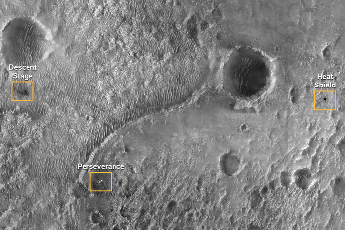 In this photograph taken by the Mars Reconnaissance Orbiter the various components of the Mars mission are seen on the planet's surface following landing.
