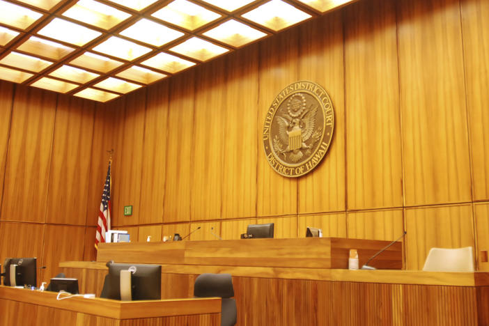 A U.S. federal courtroom sits empty in 2017 in Honolulu. A new study finds that judges with backgrounds as prosecutors or corporate lawyers are more likely to rule in favor of employers.