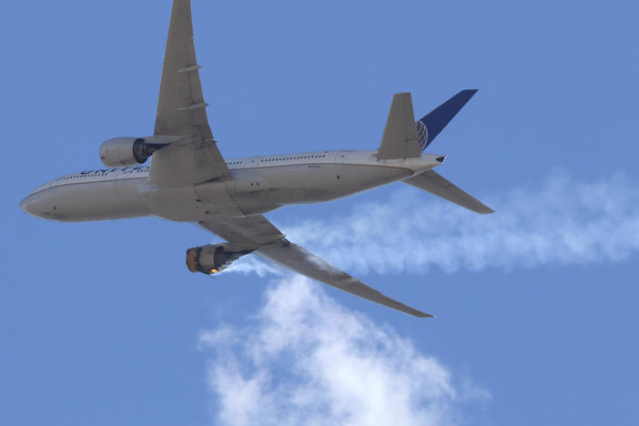 United Airlines Flight 328 approaching Denver International Airport, after experiencing "a right-engine failure" shortly after takeoff from Denver. The FAA issued an order on Tuesday grounding all aircraft powered by the same Pratt & Whitney 4000-112 engine until they've been inspected.