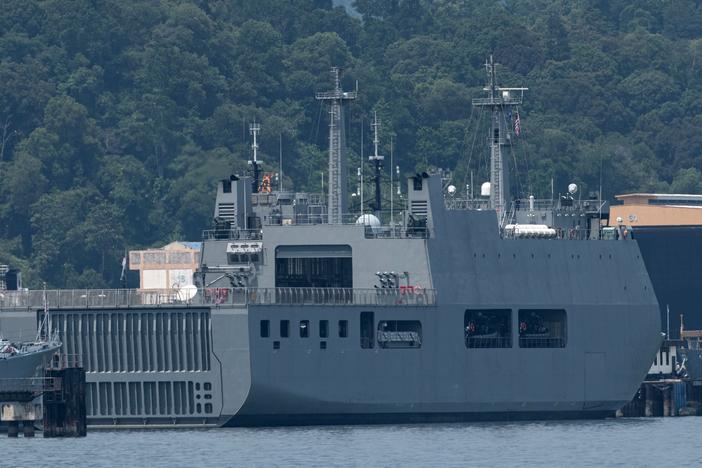 Myanmar vessel UMS Moattama, which was sent to return Myanmar migrants from Malaysia, is seen docked at a jetty outside Kuala Lumpur on Monday.