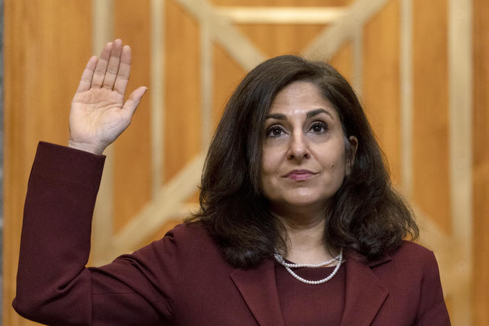 Neera Tanden, nominee for director of the Office of Management and Budget, is sworn in to testify during a Senate hearing.