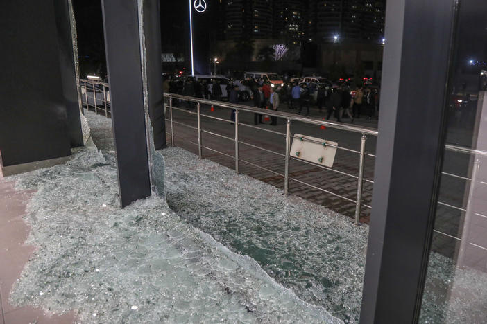 Shattered glass is on the ground following a rocket attack in Irbil, the capital of the northern Iraqi Kurdish autonomous region, on Feb. 15. On Thursday, the U.S. launched airstrikes targeting Iranian-backed groups in eastern Syria in response to recent attacks against Americans in Iraq.