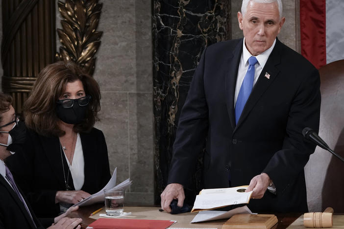 Senate parliamentarian Elizabeth MacDonough works beside then-Vice President Mike Pence earlier this year during the certification of 2020 Electoral College ballots, in the House chamber of the U.S. Capitol.