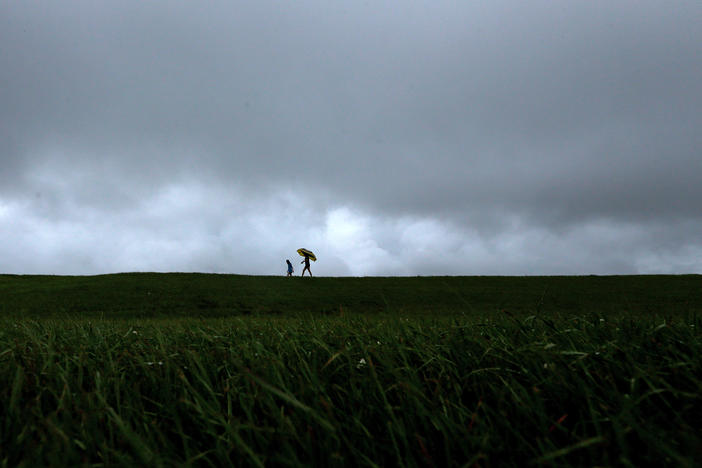 Storm clouds gather above the levee near Lake Pontchartrain as Tropical Storm Cristobal makes landfall on June 07, 2020 in New Orleans.