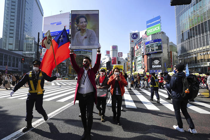 Myanmar people and supporters march during on Feb. 14 in Tokyo to protest the military coup.