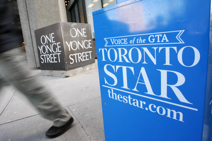 A <em>Toronto Star</em> newspaper box is seen here in front of the newspaper's Toronto offices. Torstar, the newspaper's owner, says it plans to enter the online gaming business to support its journalism.