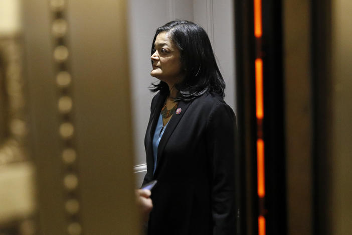 "You know, it's like a gut punch to millions of people," Washington Rep. Pramila Jayapal, who chairs the House Progressive Caucus, said about the $15-an-hour minimum wage coming out of President Biden's COVID-19 relief package. But she says her vote will be based on the bill as a whole, even though it doesn't include the wage hike.