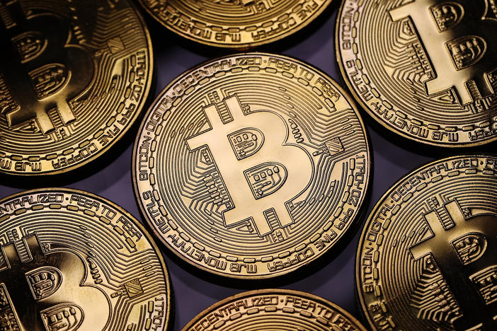 A visual representation of the digital Cryptocurrency, Bitcoin. The digital currency's meteoric rise has minted millionaires and energized true believers around the world.
