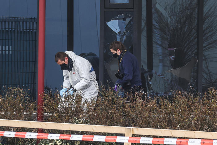 Forensic investigators search for evidence after an explosion on Wednesday at a coronavirus testing center in the town of Bovenkarpsel, The Netherlands.