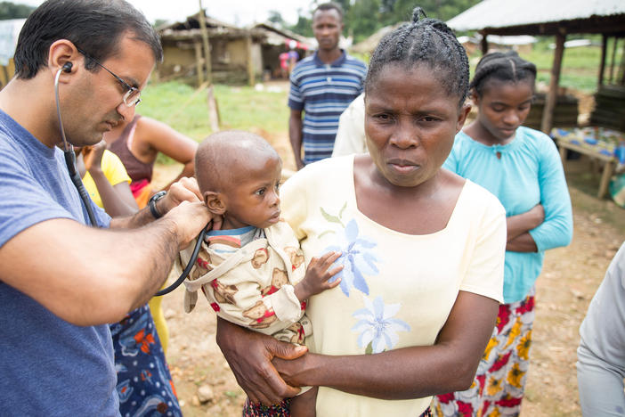 Dr. Raj Panjabi, the newly named head of the President's Malaria Initiative, treating patients during a visit to Liberia, where he was born and lived until 1990. He'll lead the effort to prevent and treat malaria around the world. Each year, some 400,000 people die of a disease that, he notes, is "preventable and treatable."