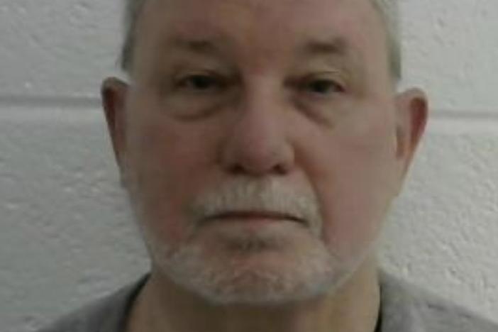 Former Laurel, Md., police chief David Crawford is under arrest, facing dozens of criminal charges related to a string of arson attacks on homes and garages.