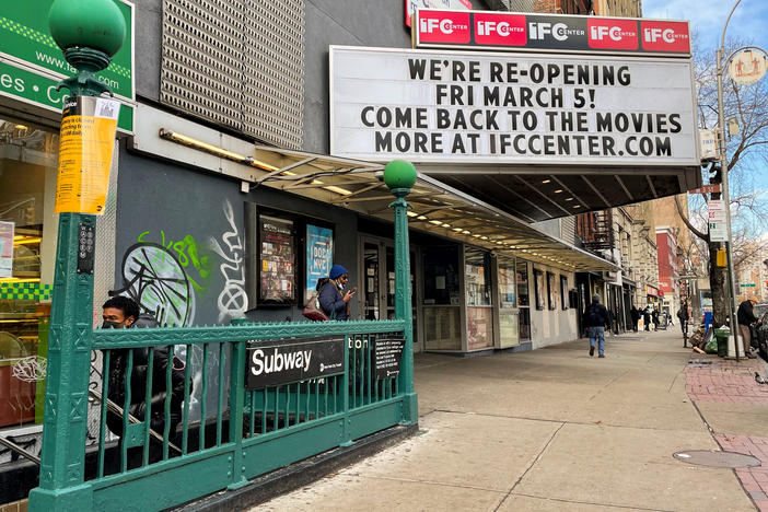 The marquee of the IFC Center in Manhattan welcomes viewers back after being closed nearly one year