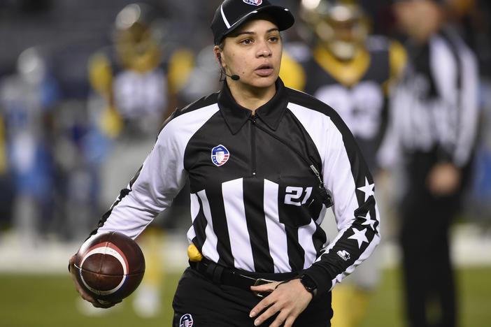Maia Chaka, shown here officiating an Alliance of American Football game in 2019, has been named the NFL's first Black female official.