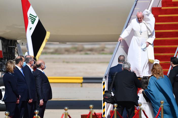 Pope Francis arrives at Baghdad International Airport on Friday for the first-ever papal visit to Iraq.