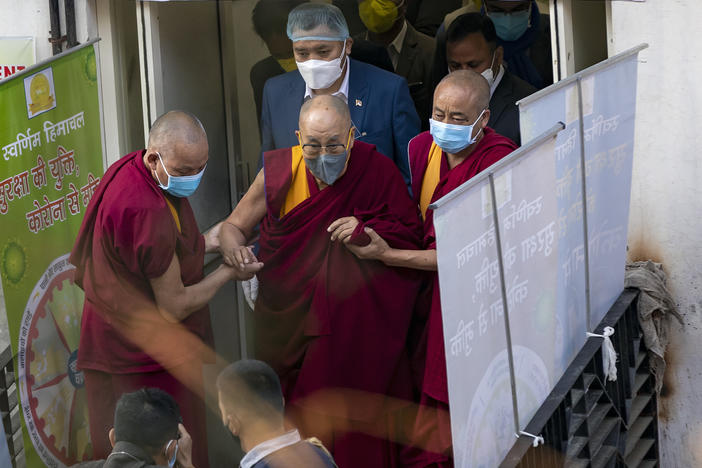 The Dalai Lama leaves the Zonal Hospital in Dharmsala, India, on Saturday after receiving the COVID-19 vaccine.