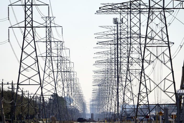 Power lines are seen on Feb. 16 in Houston. The Texas Public Utility Commission has declined to reverse $16 billion in charges from the worst of February's winter storm.