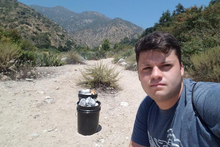 Edgar McGregor, with some of the debris he's collected from Eaton Canyon, part of the Angeles National Forest in Southern California.