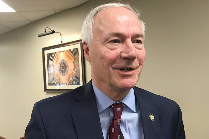 Arkansas Gov. Asa Hutchinson on Tuesday signed into law a bill banning nearly all abortions in the state, a sweeping measure that supporters hope will force the U.S. Supreme Court to revisit its landmark <em>Roe v. Wade</em> decision.