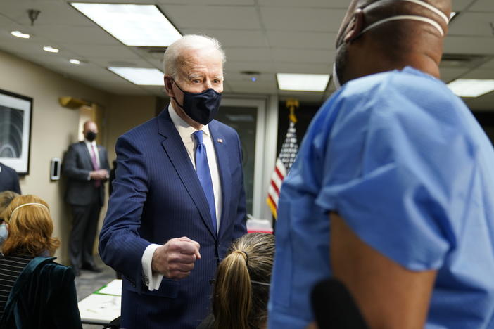 President Biden talks to recently vaccinated Army Staff Sgt. Marvin Cornish as he visits a COVID-19 vaccination site at the VA Medical Center in Washington, D.C., on Monday.