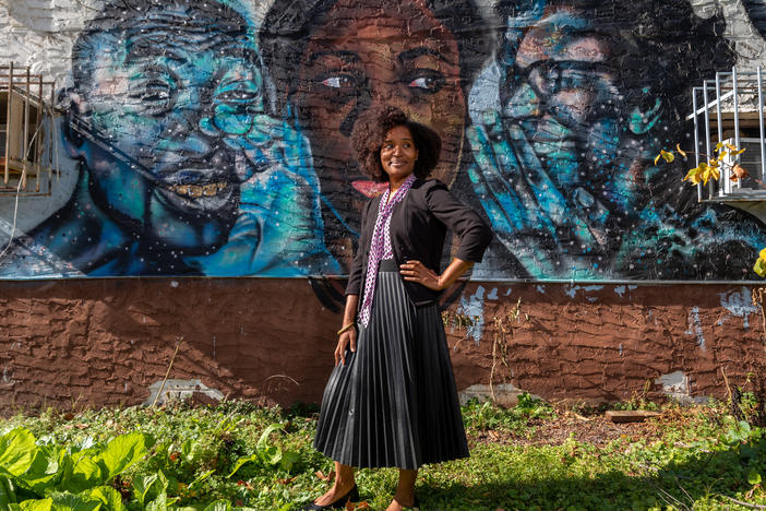 Keitra Bates stands outside of the original location of Marddy's in Atlanta. It's a shared kitchen where home cooks can prepare their goods, and collectively market them.