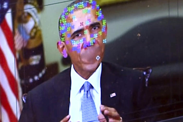 A fake video featuring former President Obama shows elements of facial mapping used in new "deepfake" technology that lets anyone make videos of real people appearing to say things they've never said. (AP Photo)