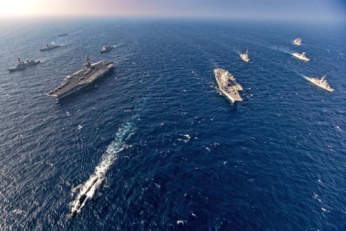 Aircraft carriers and warships participate in the second phase of Malabar naval exercise, a joint exercise by India, the U.S., Japan and Australia, in the northern Arabian Sea last November. The four countries form the Quadrilateral Security Dialogue, or the Quad.