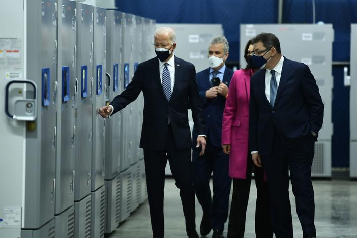 President Biden inspects COVID-19 vaccine freezers at a Pfizer plant in Kalamazoo, Mich., with White House Coronavirus Response Coordinator Jeffrey Zients, Michigan Gov. Gretchen Whitmer and Pfizer CEO Albert Bourla on Feb. 19.