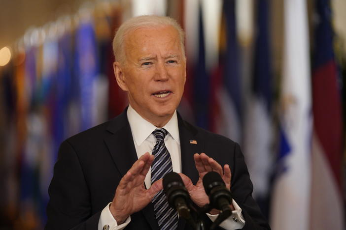 President Biden speaks in the East Room of the White House Thursday night.
