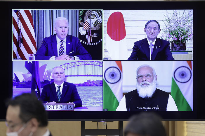 President Biden (clockwise from top left), Japanese Prime Minister Yoshihide Suga, Indian Prime Minister Narendra Modi and Australian Prime Minister Scott Morrison participate in the virtual Quadrilateral Security Dialogue or Quad meeting on Friday.