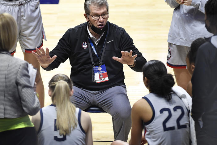 Connecticut head coach Geno Auriemma talks to his team during a game against Villanova in the Big East tournament on March 7, 2021. Auriemma has tested positive for the coronavirus.