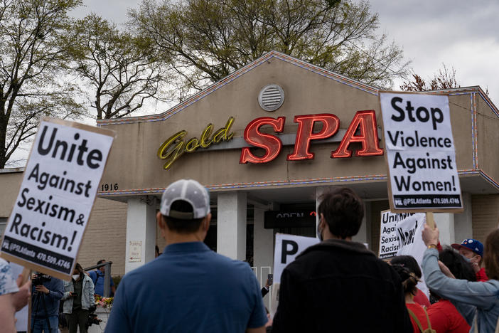 Activists demonstrate outside Gold Spa in Atlanta where a mass shooter killed three women on Tuesday night in a rampage that left eight people dead, including six Asian women.