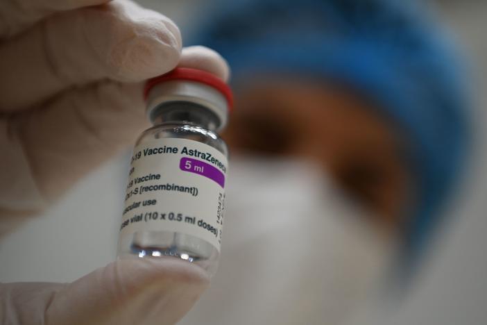 "There are not yet enough vaccine doses in Europe to stop the third wave by vaccination alone," German Health Minister Jens Spahn said Friday. Here, a health care worker displays a vial of the AstraZeneca COVID-19 vaccine in Stuttgart, Germany.