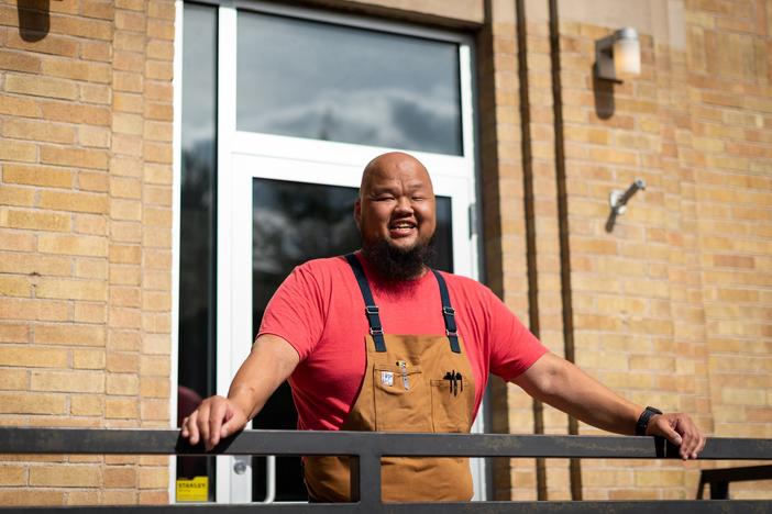 Chef Yia Vang's restaurant in Minneapolis is getting ready to open amid a fierce debate within the restaurant industry about the minimum wage. The restaurant will not have tipping.