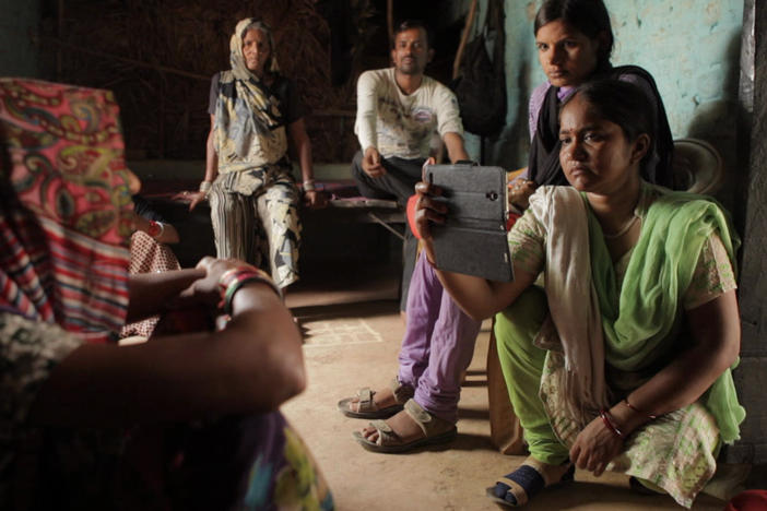 The award-winning documentary <em>Writing with Fire</em> follows Meera Devi (right), chief reporter for the <em>Khabar Lahariya —</em> a news publication run by Dalit, members of India's lowest caste.<em> </em>