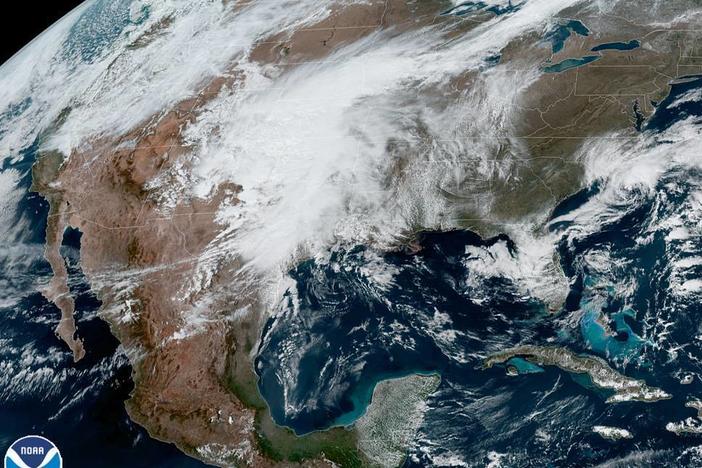 A U.S. satellite captures cloud cover over North America on Monday. The National Oceanic and Atmospheric Administration announced it has upgraded its weather forecasting model to use more satellite weather data.
