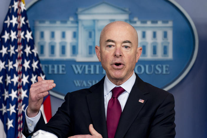 Homeland Security Secretary Alejandro Mayorkas addresses a press briefing this month. Mayorkas has tried to discourage migrants from coming north and blamed the Trump administration for dismantling the system that processes and cares for them.
