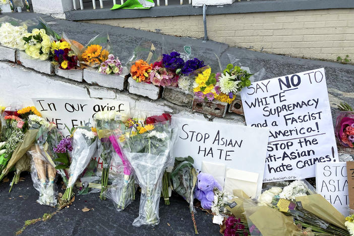 A makeshift memorial is seen on Friday in Atlanta, following the mass shooting of eight people, six of whom were of Asian descent, at three different massage parlors.