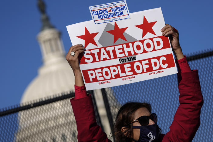 Residents of the District of Columbia rally for statehood Monday near the U.S. Capitol ahead of a House committee hearing on the effort.