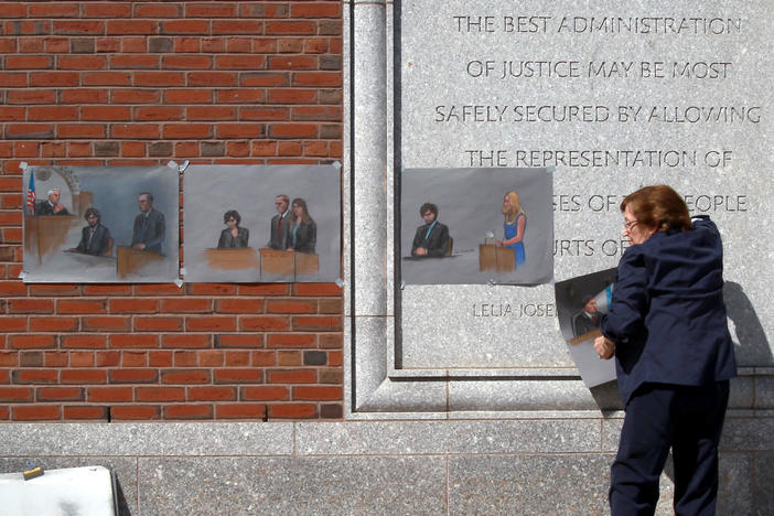 The U.S. Supreme Court will review a lower court's decision from last summer that vacated the six death sentences imposed on Boston Marathon bomber Dzhokhar Tsarnaev. Here, artist Jane Flavell Collins pulls down her courtroom sketches outside the Moakley U.S. Courthouse in Boston after Tsarnaev was sentenced.