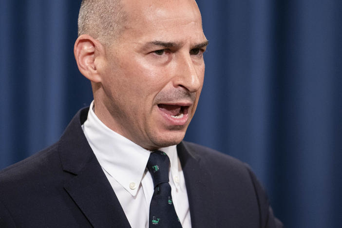 Then-acting U.S. Attorney Michael Sherwin speaks during a news conference on Jan. 12. After an interview Sherwin gave about the ongoing Capitol insurrection investigation, a federal judge criticized the Justice Department with a potential gag order.