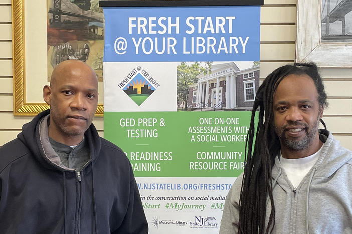 Brothers Dennis (left) and Lee Horton were recently released from prison. The New Jersey Public Library's Fresh Start program has helped them navigate daily life and learn new technology that didn't exist in 1993.
