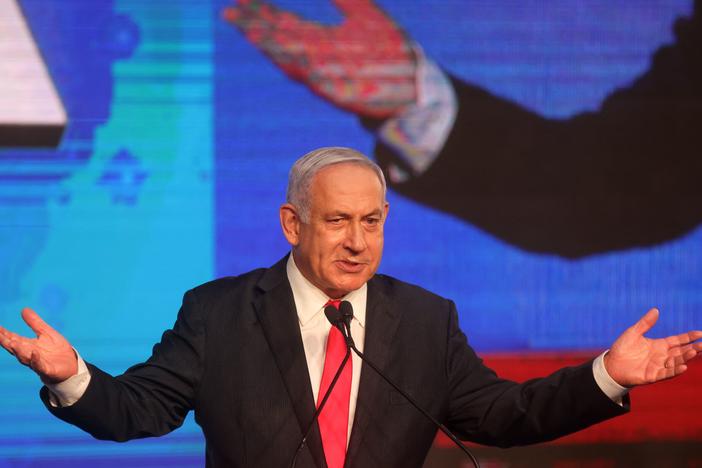 Israeli Prime Minister Benjamin Netanyahu, leader of the Likud party, addresses supporters at the party campaign headquarters in Jerusalem early Wednesday after the end of voting in the fourth national election in two years.