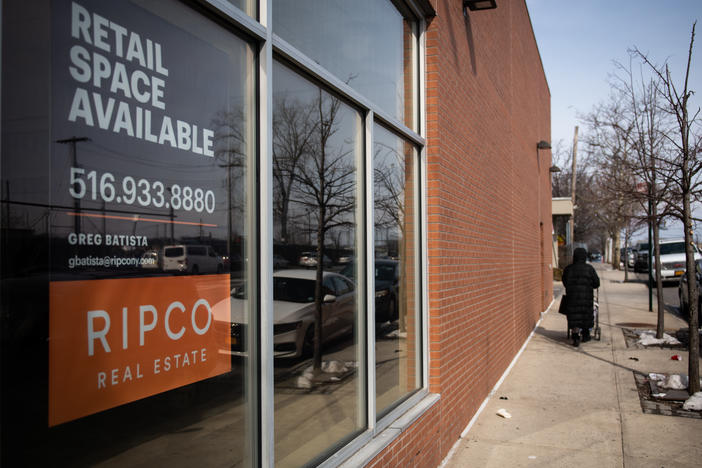 A "Retail Space Available" sign is displayed in the window of a closed JPMorgan Chase & Co. branch in the Bronx borough of New York City on Feb. 22, 2019. Banks have been closing branches, a trend that has accelerated during the pandemic as more people manage their accounts online.